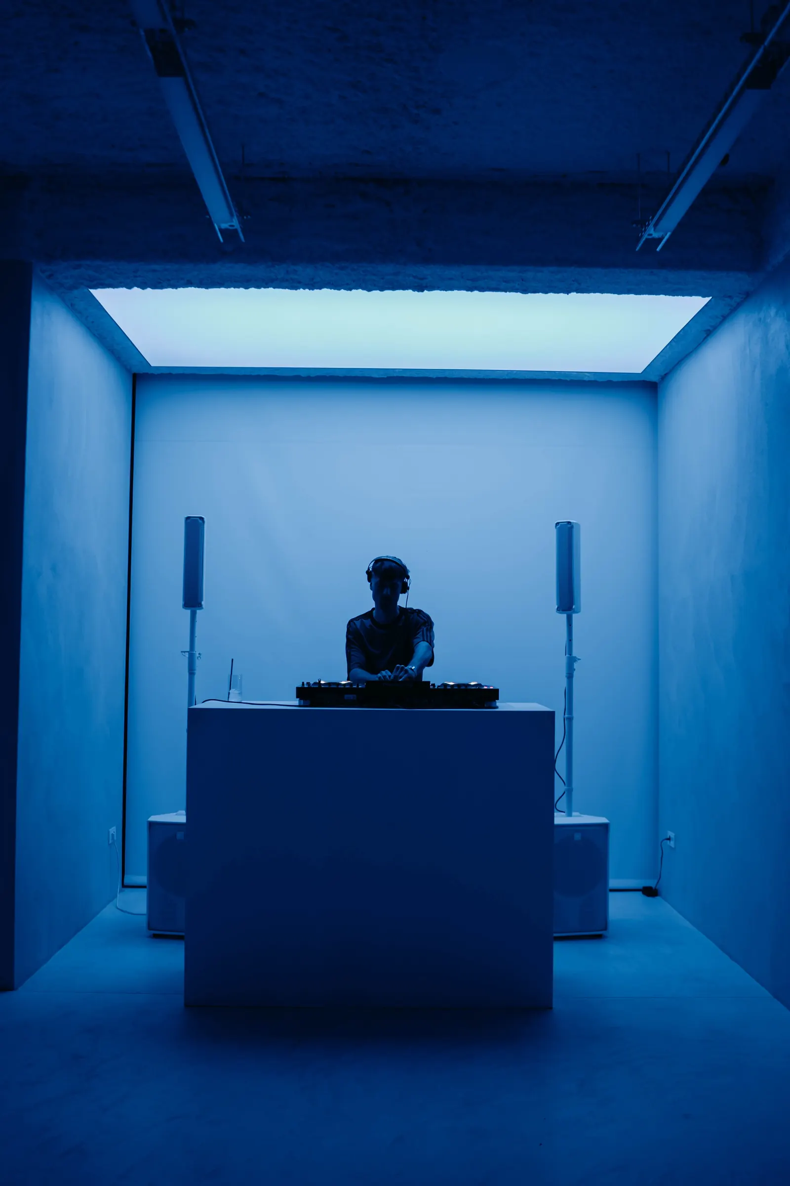 DJ set in the blue-lit space at the ALTO pop-up, Holographik Space, Zagreb