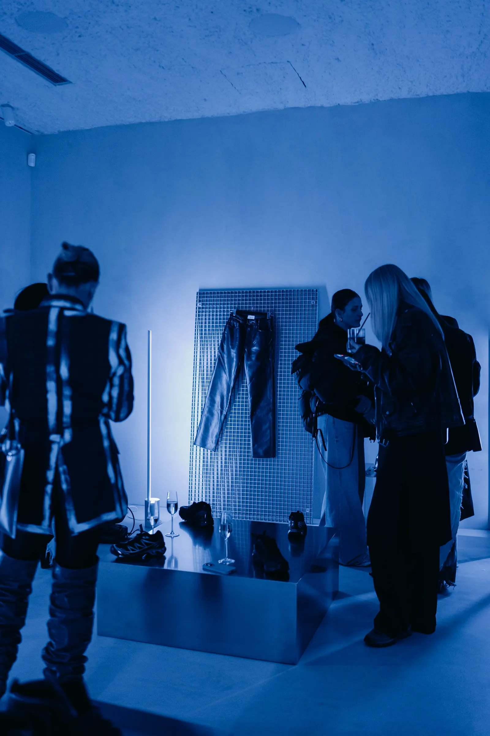 Guests around a steel plinth at the ALTO pop-up, Holographik Space, Zagreb