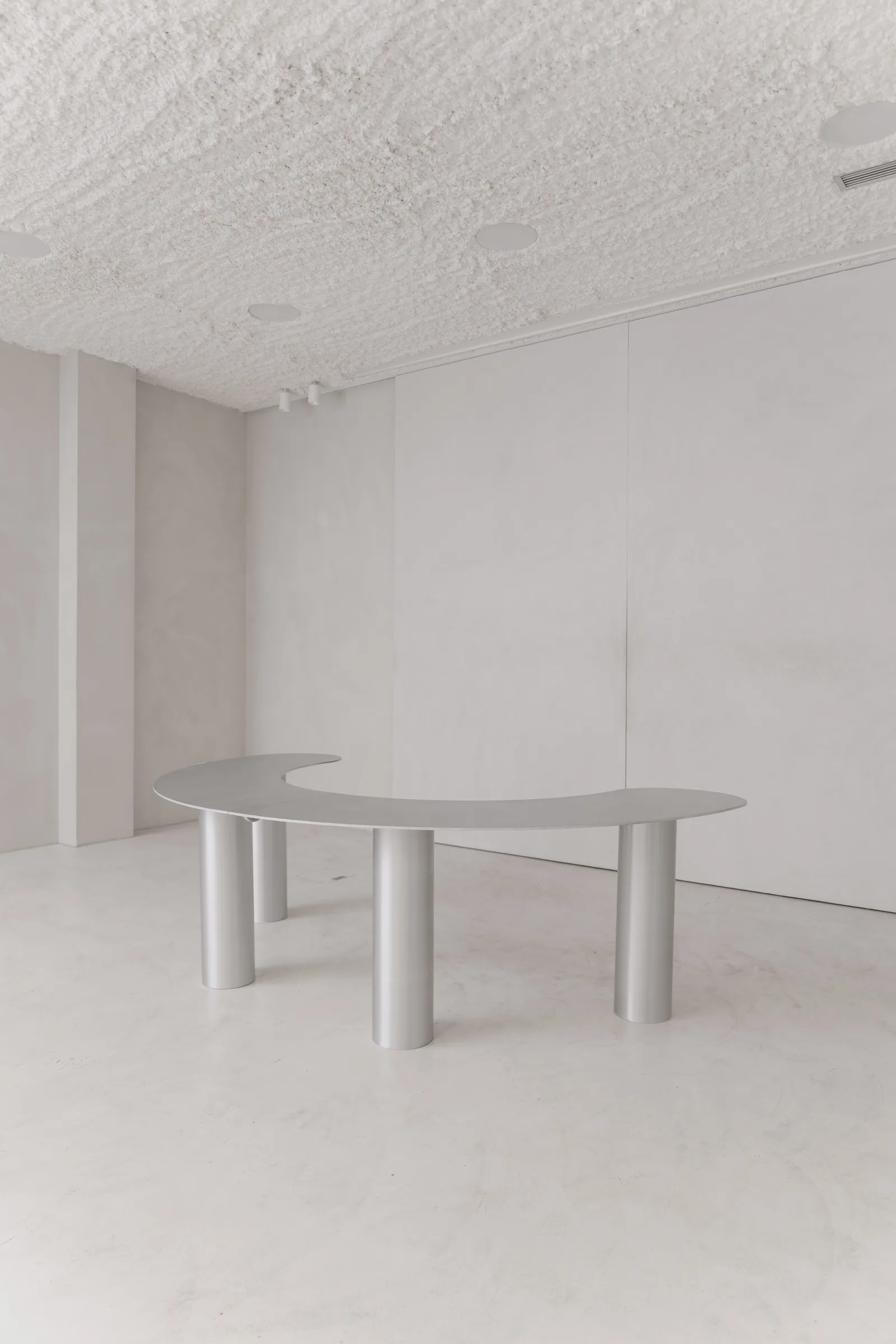 Aluminium table by Bottone in the main room at Holographik Space, Zagreb