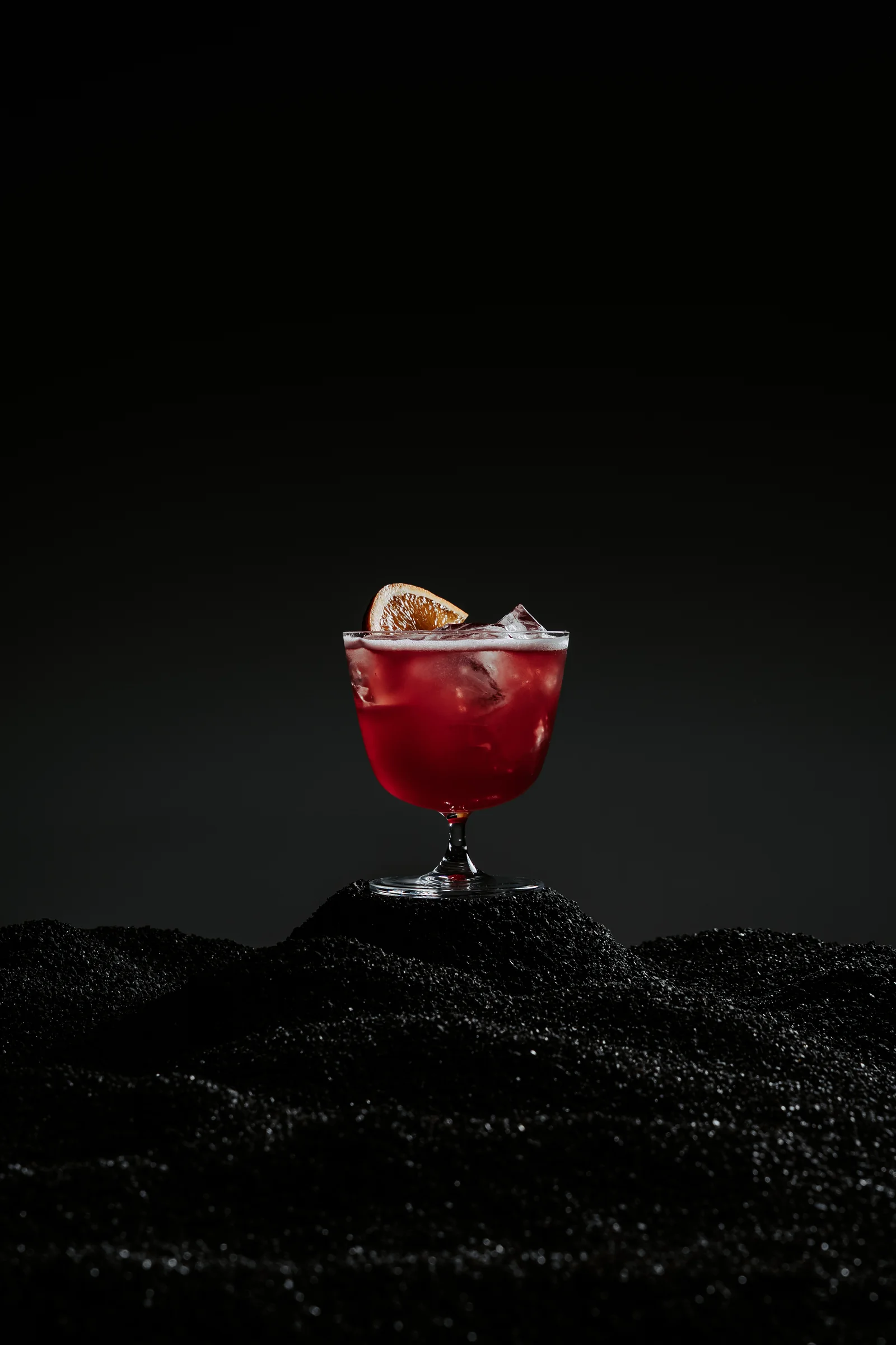 Refine, Campari and red wine cocktail with forest fruit, walnut and pineapple soda
