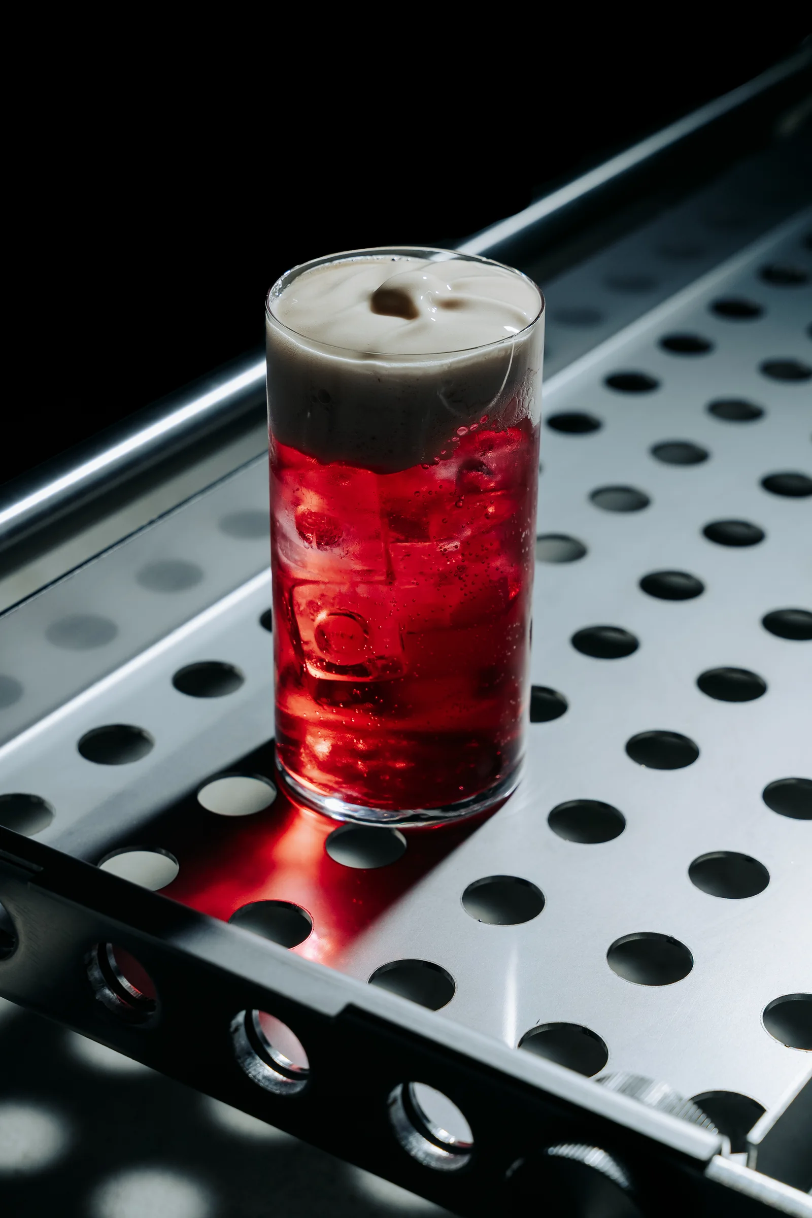 Halftone, a mocktail with Almave, rue berry, cherry soda and rooibos vanilla foam