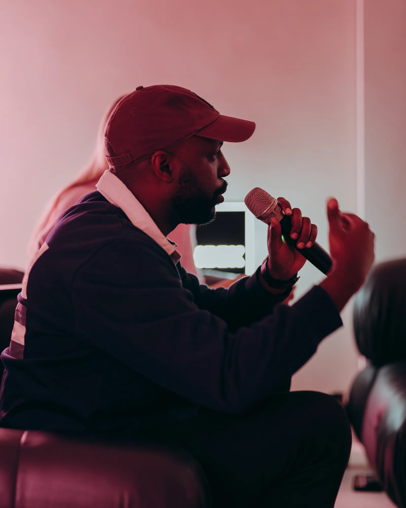 A guest with the microphone at the previous edition of The Drop by Taste